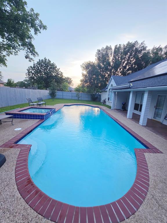 520 Red River Road Belton, TX 76513 - Photo 35 of 36 Backyard oasis featuring a large inground swimming pool with a connected spa