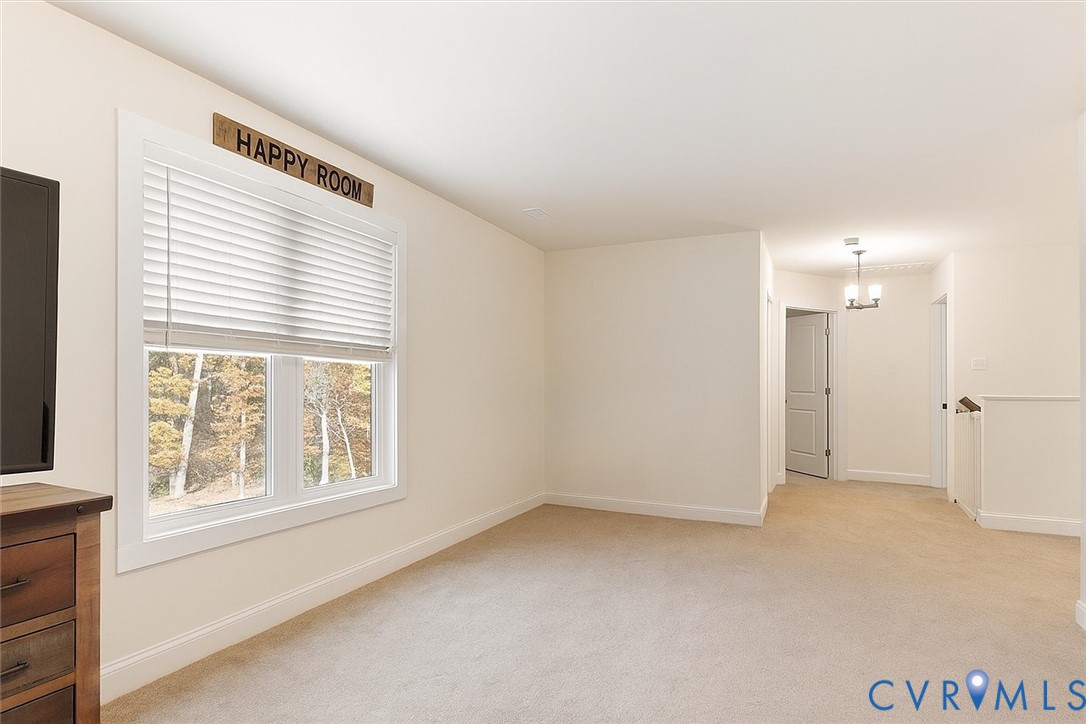 2715 Ballsville Road Powhatan, VA 23139 - Photo 23 of 30 Spare room featuring light colored carpet