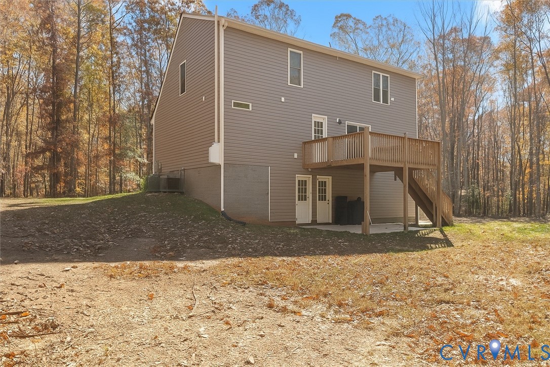 2715 Ballsville Road Powhatan, VA 23139 - Photo 28 of 30 Rear view of property with a deck, a patio area, s