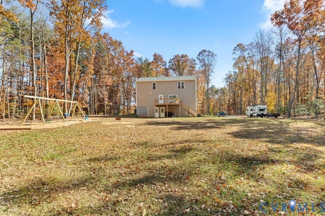2715 Ballsville Road Powhatan, VA 23139 - Photo 30 of 30 Rear view of property with a playground, stairs, a