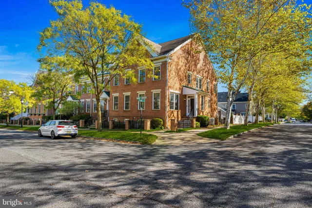 a view of a balcony with wooden floor