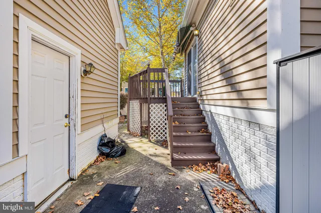 a view of empty room with stairs