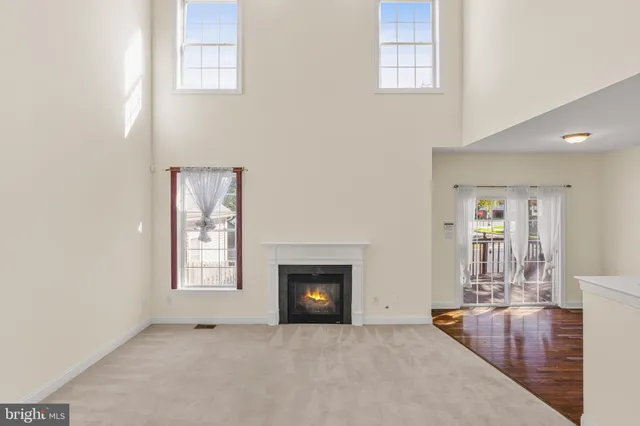 a view of empty room with windows