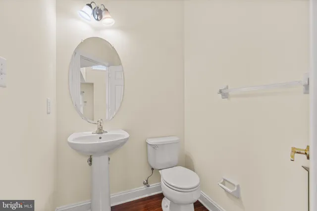 a view of a room with a ceiling fan