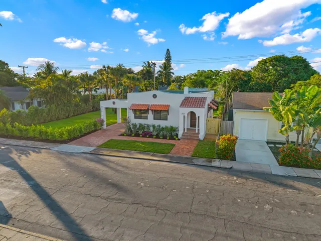 a view of house with outdoor space and street view