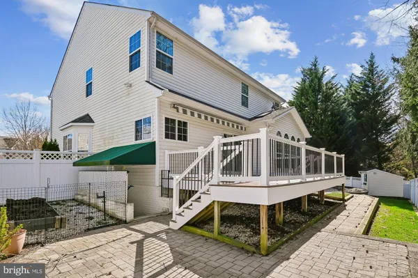 a front view of a house with swimming pool