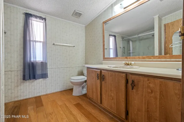 a bedroom with furniture or couch and a painting on the wall