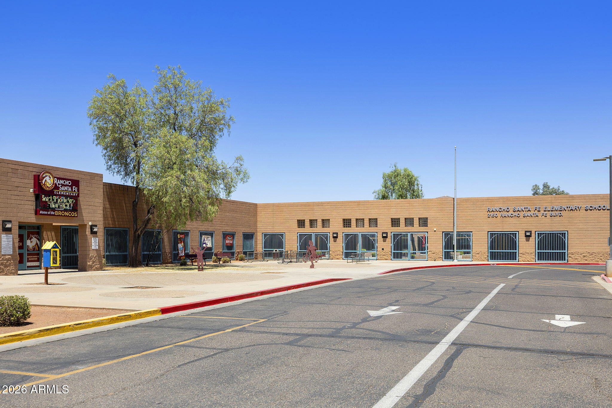12435 West Monte Vista Road Avondale, AZ 85392 - Photo 59 of 69 a view of a building with a street