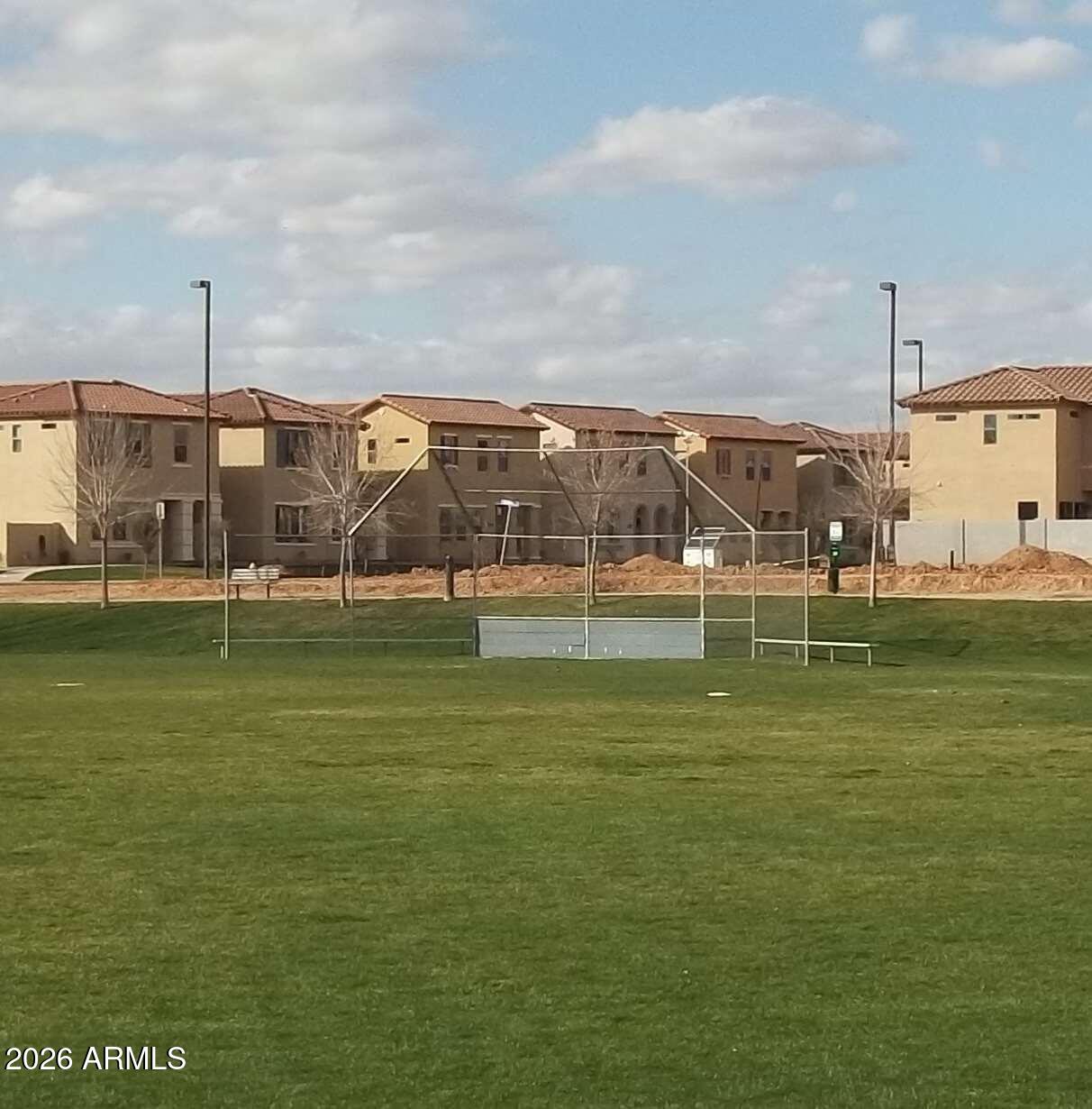 4168 East Sandy Way Gilbert, AZ 85297 - Photo 43 of 47 a view of a golf course with a lake