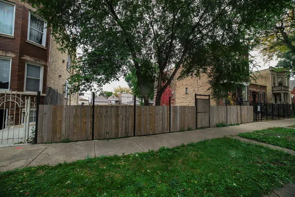 a view of backyard with green space