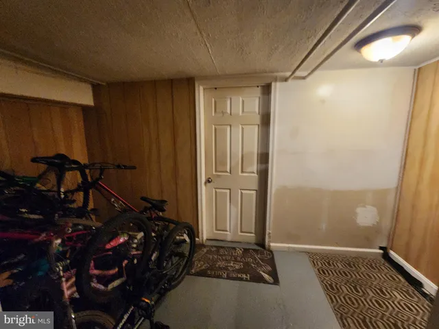 a bedroom with a bed and a closet