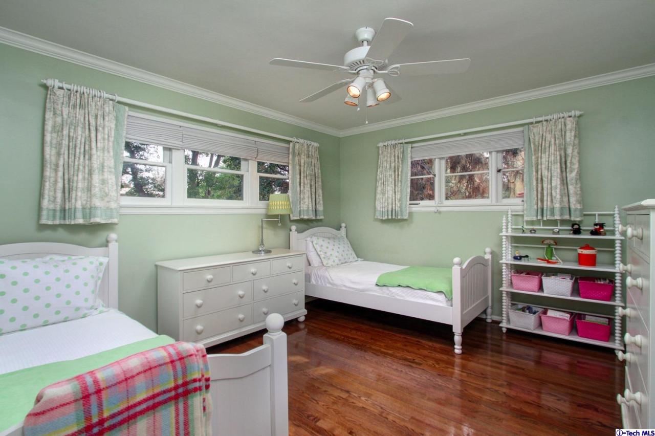 150 Sierra View Road Pasadena, CA 91105 - Photo 22 of 29 a bedroom with furniture and a wooden floor