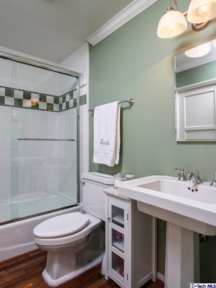150 Sierra View Road Pasadena, CA 91105 - Photo 23 of 29 a bathroom with a sink a toilet and shower