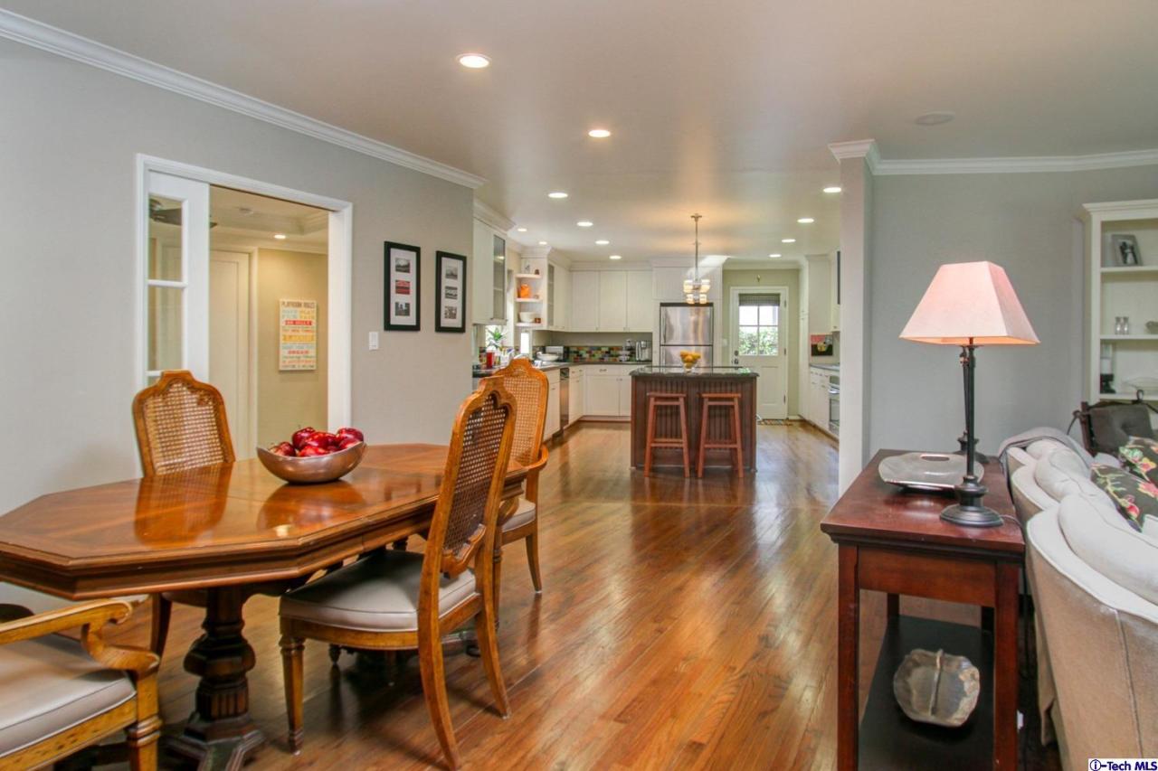 150 Sierra View Road Pasadena, CA 91105 - Photo 9 of 29 a dining room with furniture and wooden floor