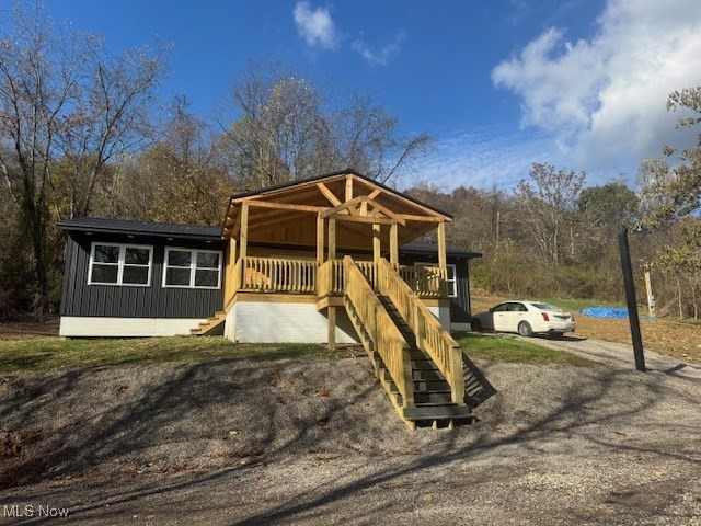 2445 McCord Hill Road Wellsburg, WV 26070 - Photo 3 of 37 View of front facade featuring stairway