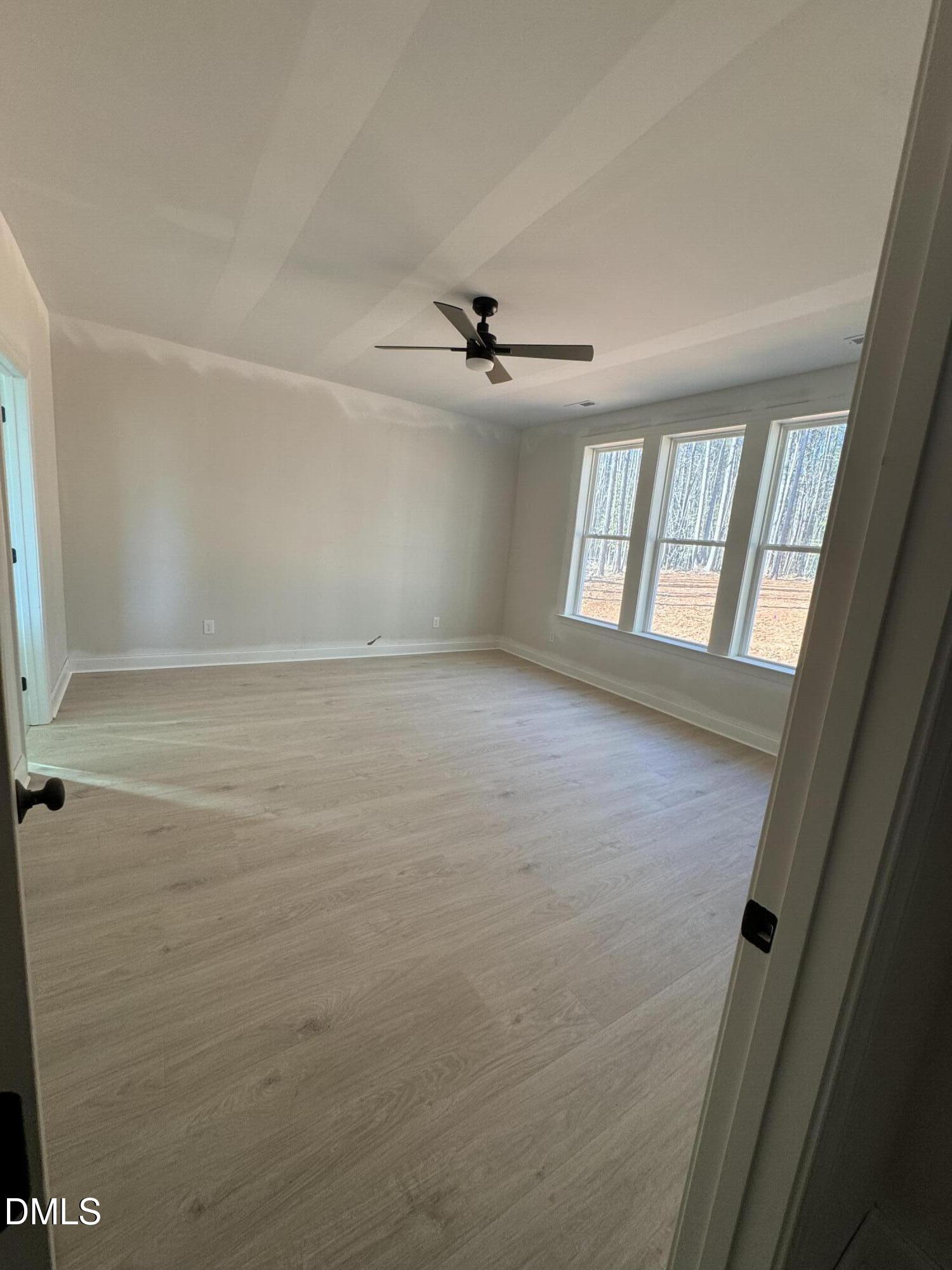 134 West Victoria Rdg Drive, Unit 22 Selma, NC 27576 - Photo 10 of 18 a view of an empty room with a window