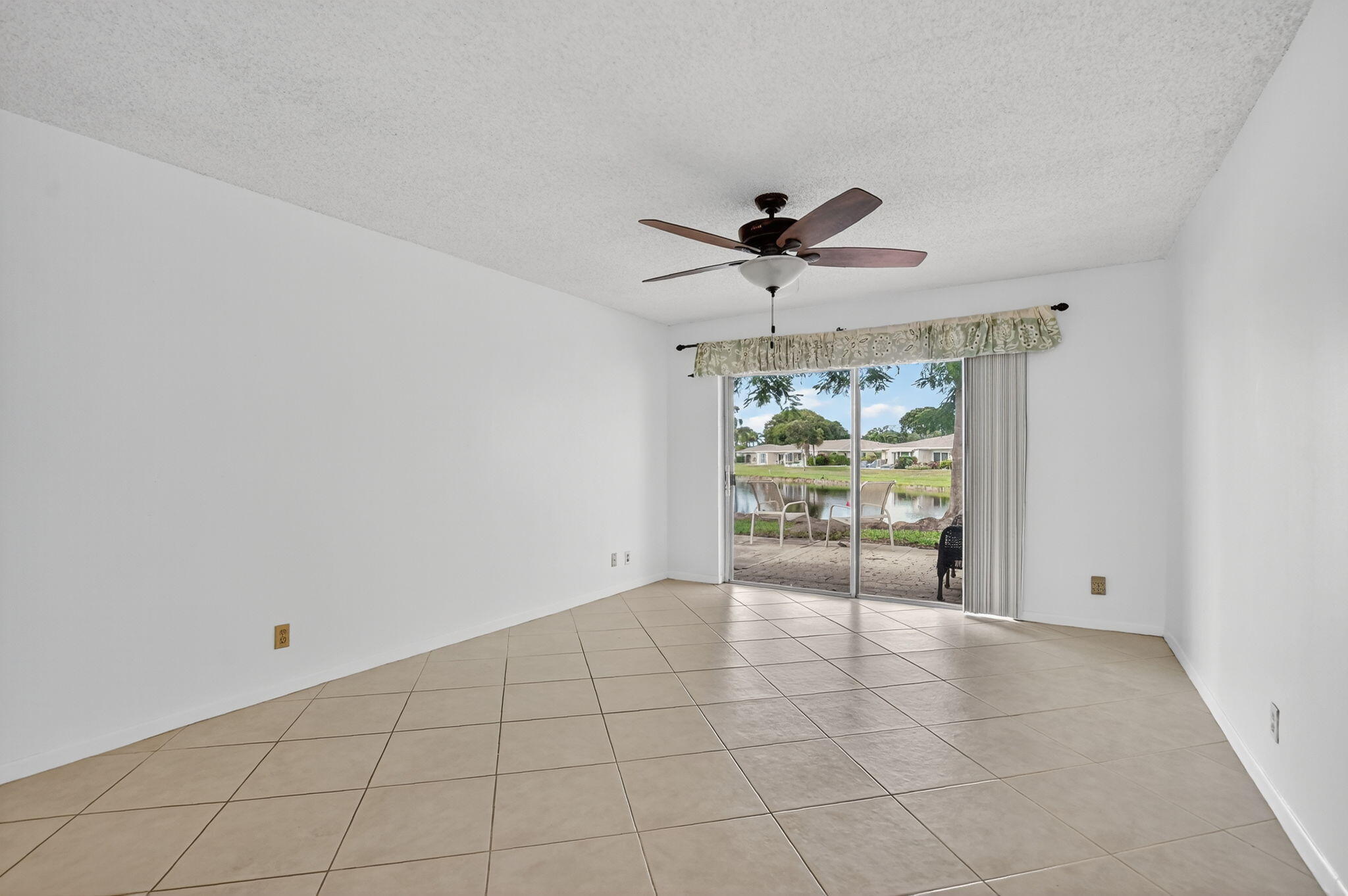 8747 Warwick Drive Boca Raton, FL 33433 - Photo 12 of 38 Living Room w/Lake View