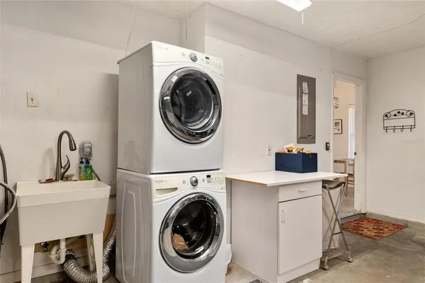a bathroom with a shower and a sink