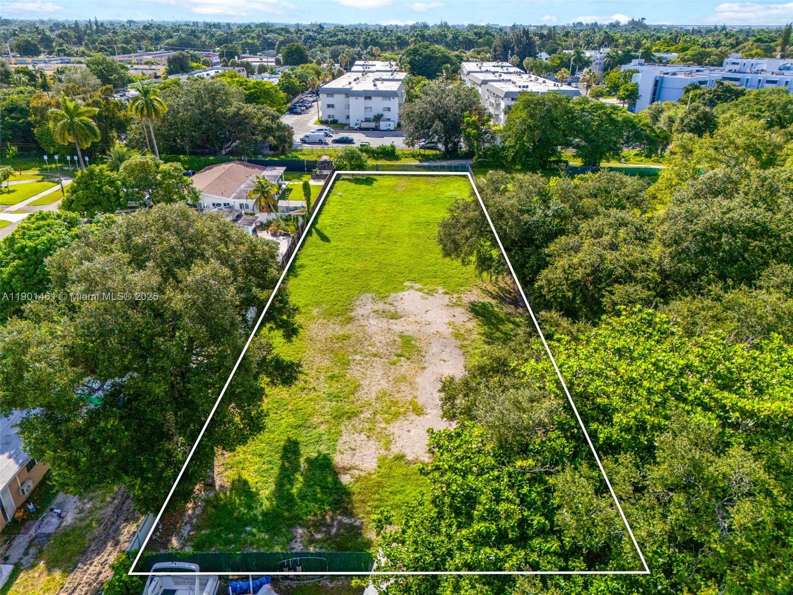 152-nd Street Northeast 152nd Street Miami, FL 33162 - Photo 12 of 16 an aerial view of residential houses with yard
