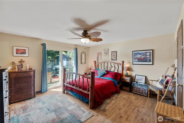 a bed room with a bed and a dresser
