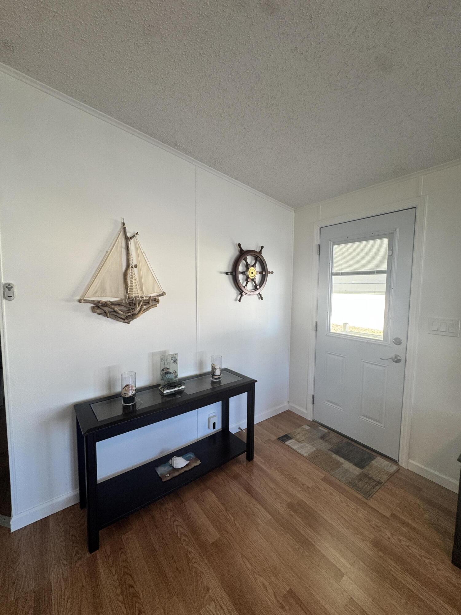 13965 Garza Court Fort Pierce, FL 34951 - Photo 34 of 44 a bedroom with furniture and window