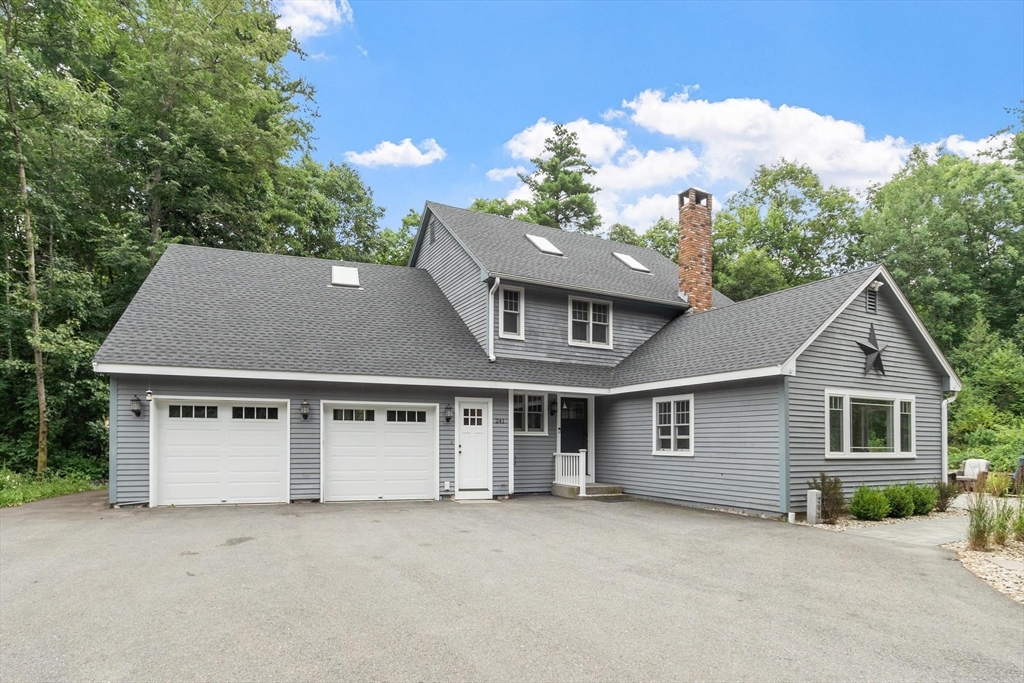 241 Reservoir Road Lunenburg, MA 01462 - Photo 1 of 40 front view of a house with a small yard