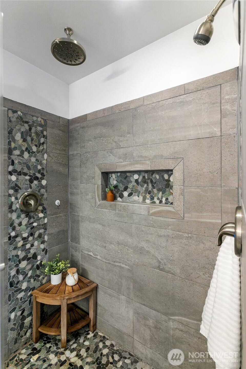 9504 Southwest Caulfield Lane Port Orchard, WA 98367 - Photo 26 of 40 a bench sitting in middle of a room