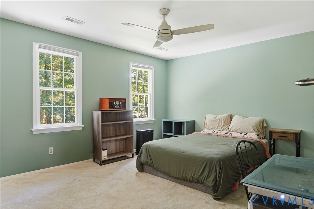 12512 2nd Branch Road Chesterfield, VA 23838 - Photo 36 of 56 a bedroom with a bed and a window