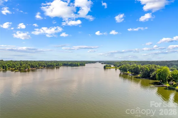 a view of a lake with a city