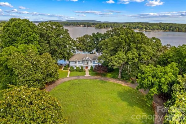 a view of a house with a lake view