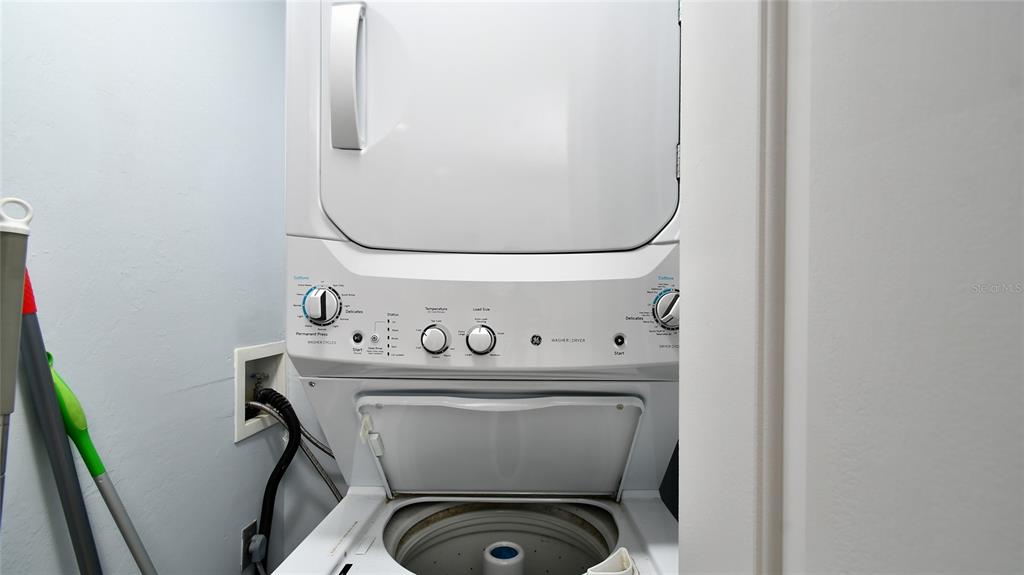 2090 Matecumbe Key Road, Unit 1308 Punta Gorda, FL 33955 - Photo 13 of 29 a utility room with dryer and washer