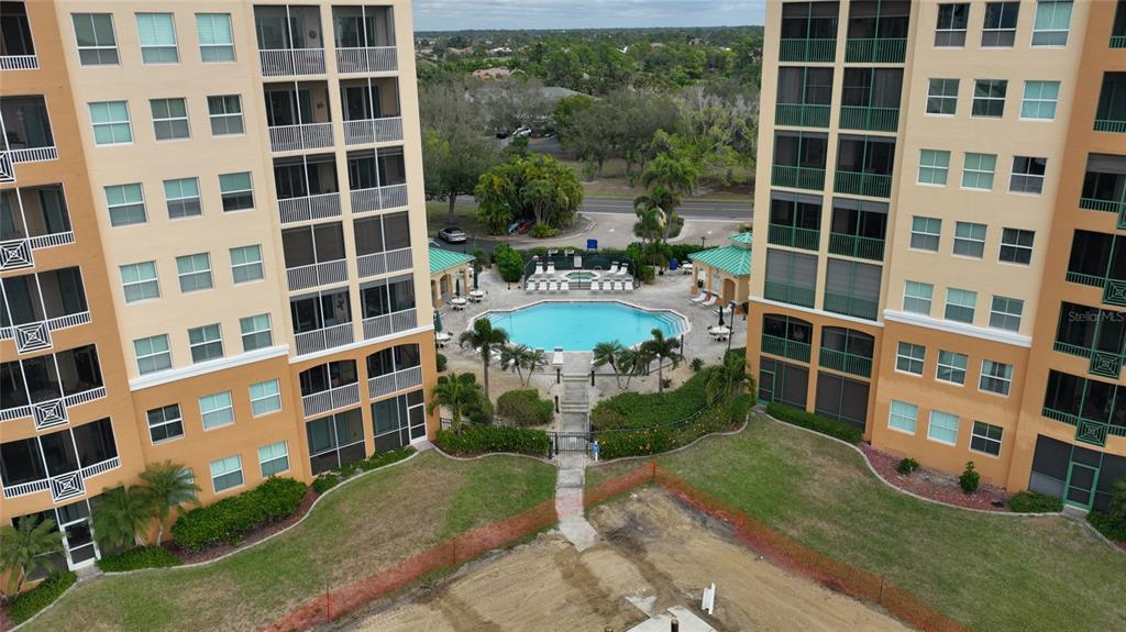 2090 Matecumbe Key Road, Unit 1308 Punta Gorda, FL 33955 - Photo 23 of 29 a view of front a building and a yard