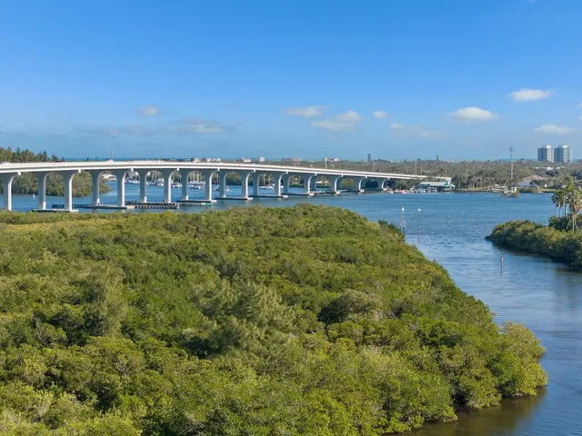 a view of a lake with a building in the background