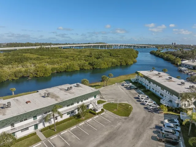 an aerial view of a city with lawn chairs