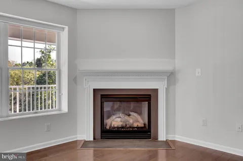 a living room with a fireplace