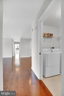 a view of a hallway with closet