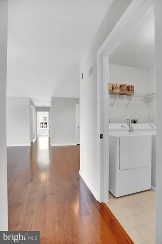 a view of a hallway with closet