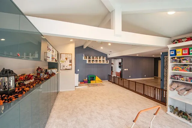 a view of a hallway with a lots of car windows