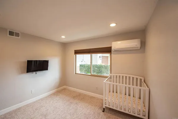 a view of livingroom with furniture and windows