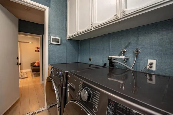 a kitchen with a stove and a microwave