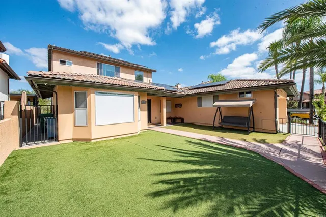 a house view with a garden space