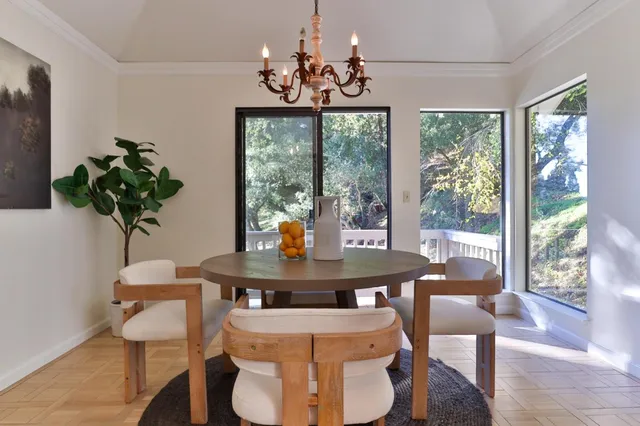 a view of hallway with chandelier