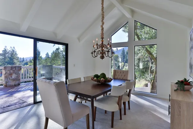 a view of a house with a yard and plants
