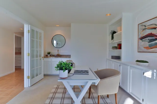 a bedroom with a bed and a couch