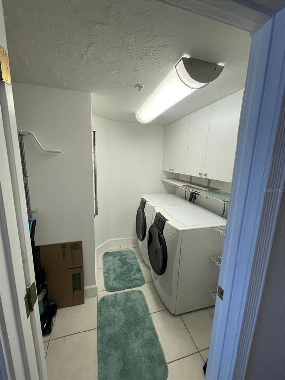 4651 South Atlantic Avenue, Unit 9105 Ponce Inlet, FL 32127 - Photo 20 of 20 a utility room with dryer and washer