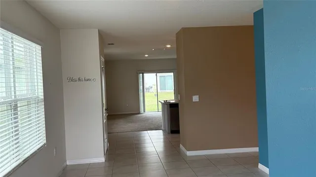 a view of an empty room with window