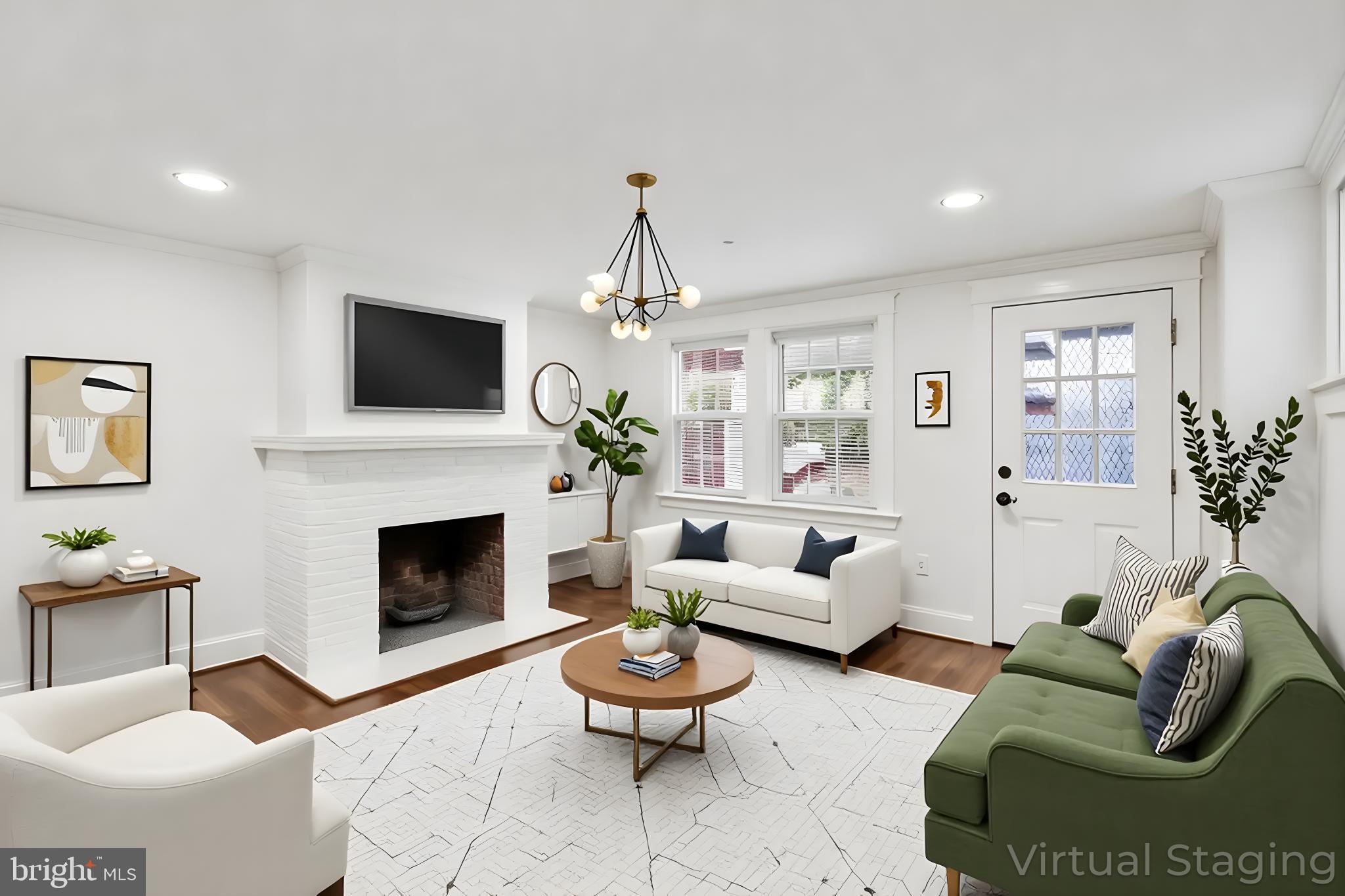 333 Blanchard Road Drexel Hill, PA 19026 - Photo 12 of 45 a living room with furniture a flat screen tv and a fireplace