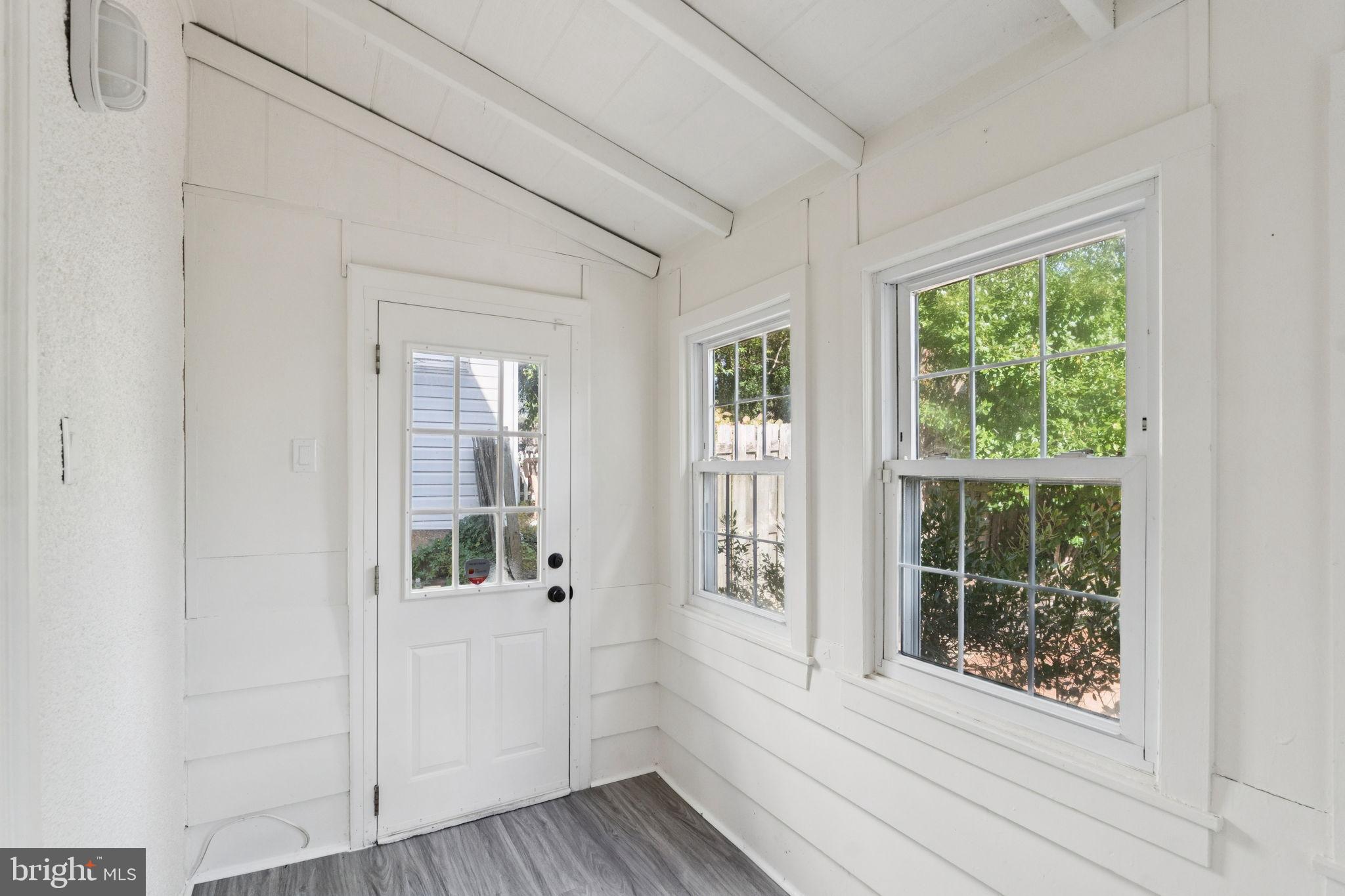 333 Blanchard Road Drexel Hill, PA 19026 - Photo 23 of 45 a view of a bedroom with wooden floor and windows