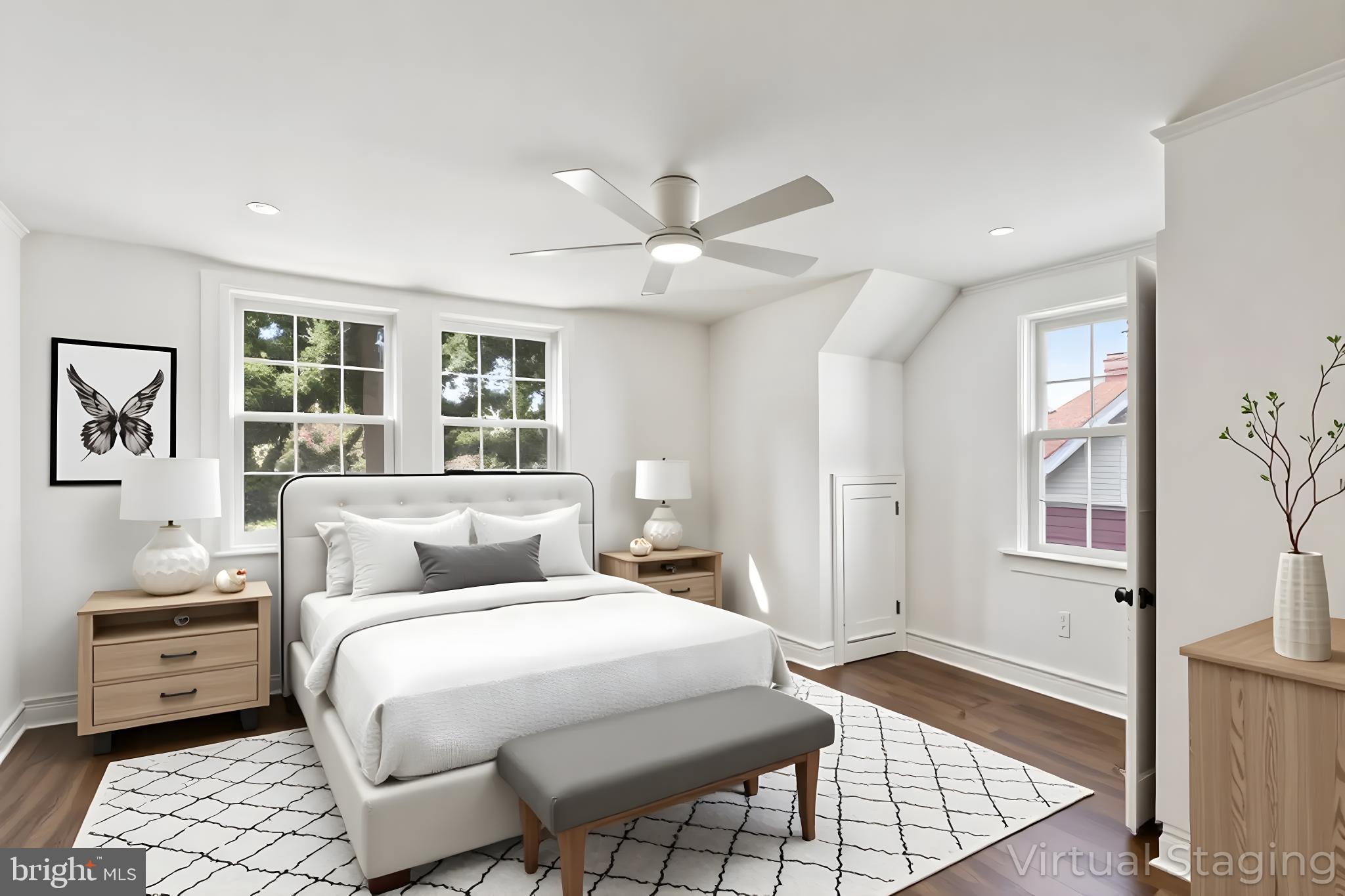 333 Blanchard Road Drexel Hill, PA 19026 - Photo 27 of 45 a bedroom with a large bed and a chandelier