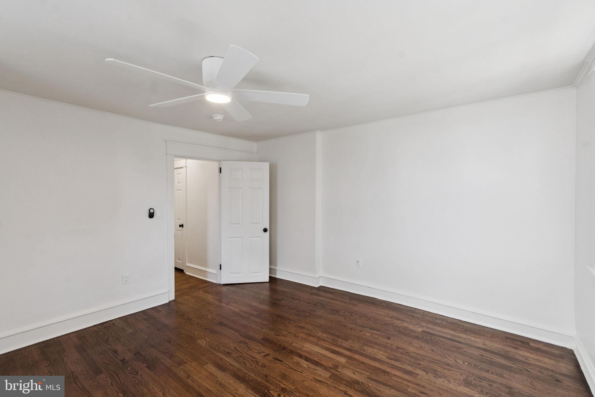 333 Blanchard Road Drexel Hill, PA 19026 - Photo 30 of 45 a view of an empty room with wooden floor